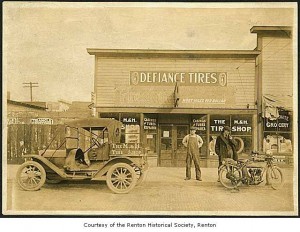 M&H tire shop 1912 in Renton, WA showing and Excelsior (photo - MOHAI)