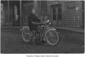 Norman on his circa 1914 Excelsior 61 c.i. twin at the Taylor WA post office (MOHAI)