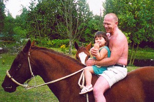 Gina and her dad Rick riding Angel