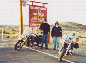 Tom Lee and myself at Four Corners in May of 2002. It was real cold out, next morning it was 28 above. We rode sourth fast into New Mexico then west into Arizona. When we got home it was 87 above. It felt real good! 